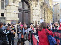 Françoise Mariotti with the loudspeaker singing with Joy. (2x2)